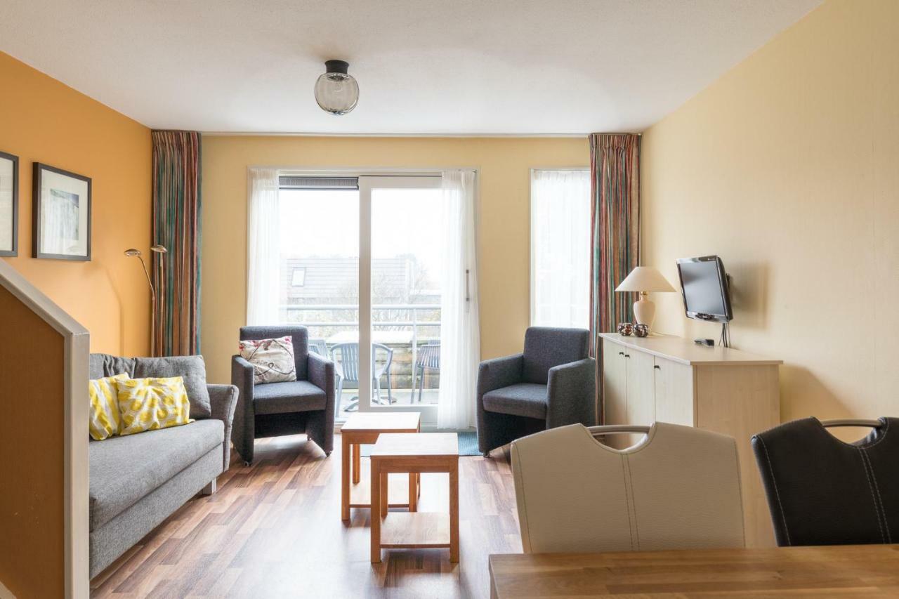 Appartement De Vrijbuiter, Resort Amelander Kaap Холлум Экстерьер фото