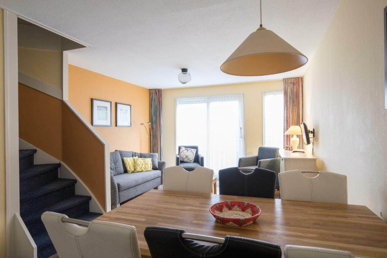 Appartement De Vrijbuiter, Resort Amelander Kaap Холлум Экстерьер фото