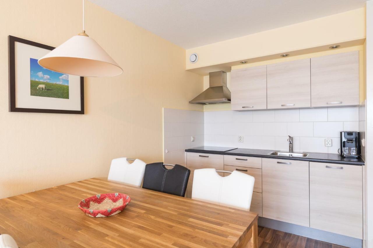 Appartement De Vrijbuiter, Resort Amelander Kaap Холлум Экстерьер фото