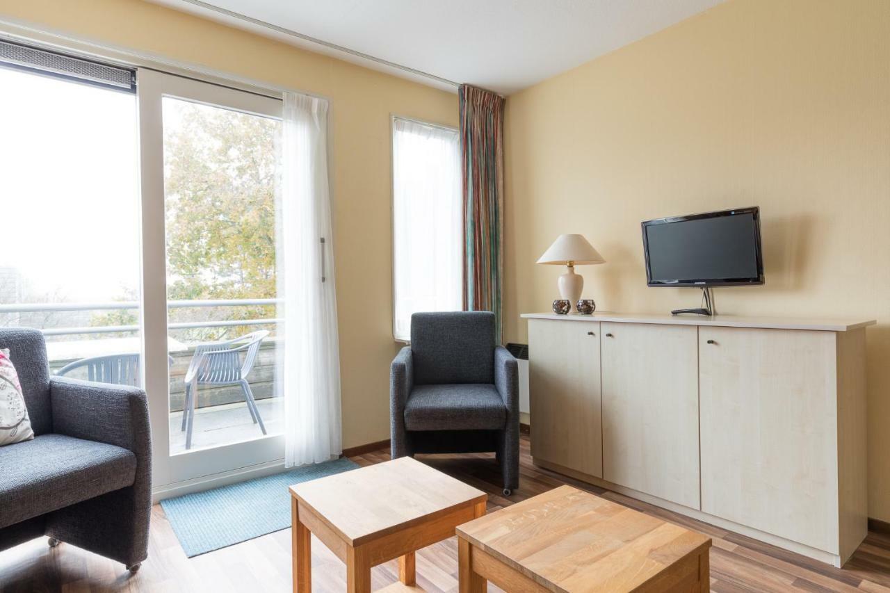 Appartement De Vrijbuiter, Resort Amelander Kaap Холлум Экстерьер фото