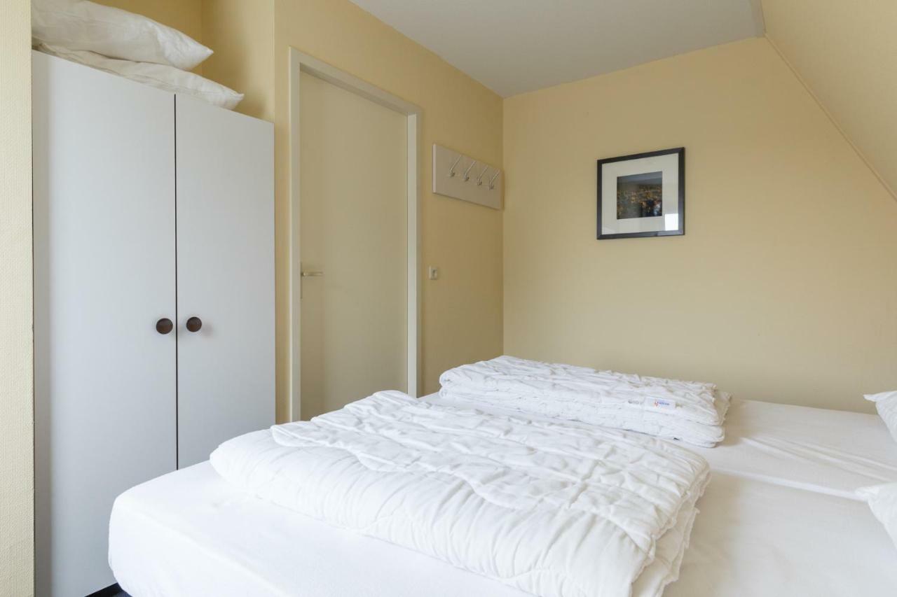 Appartement De Vrijbuiter, Resort Amelander Kaap Холлум Экстерьер фото