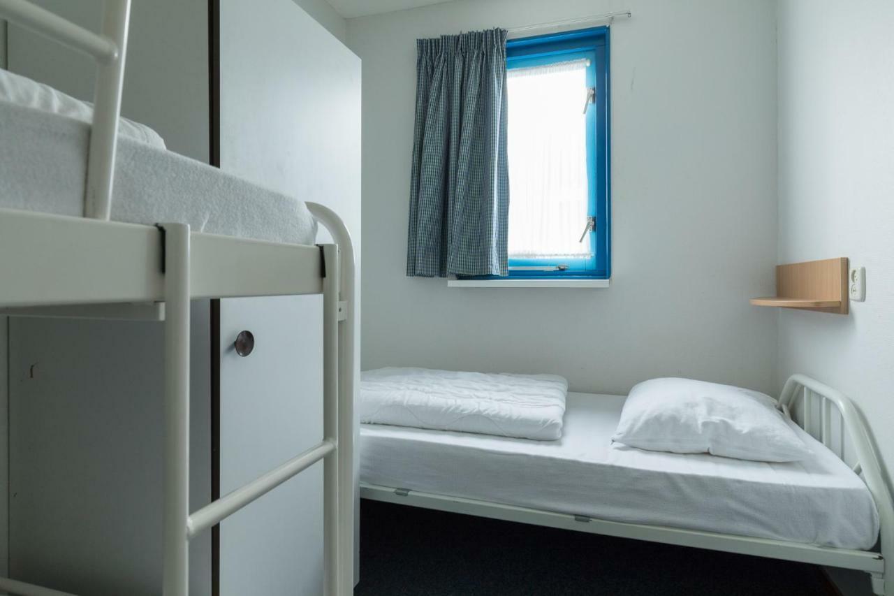 Appartement De Vrijbuiter, Resort Amelander Kaap Холлум Экстерьер фото