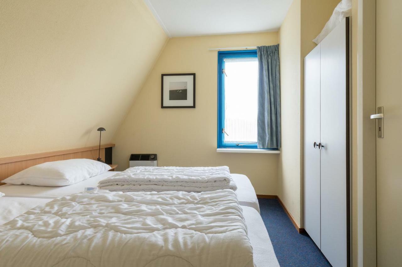Appartement De Vrijbuiter, Resort Amelander Kaap Холлум Экстерьер фото